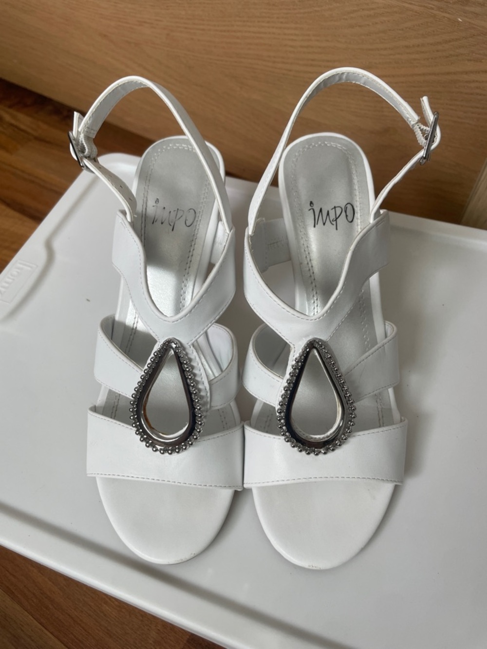 Impo White Slingback Sandals with Teardrop Metal Accent